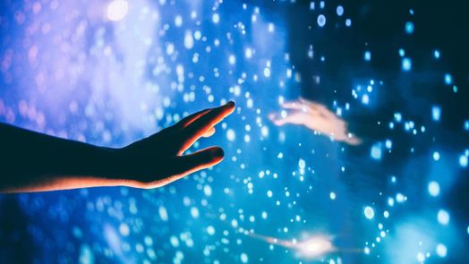 A human hand reaching out to the dark unknown, the dark matter